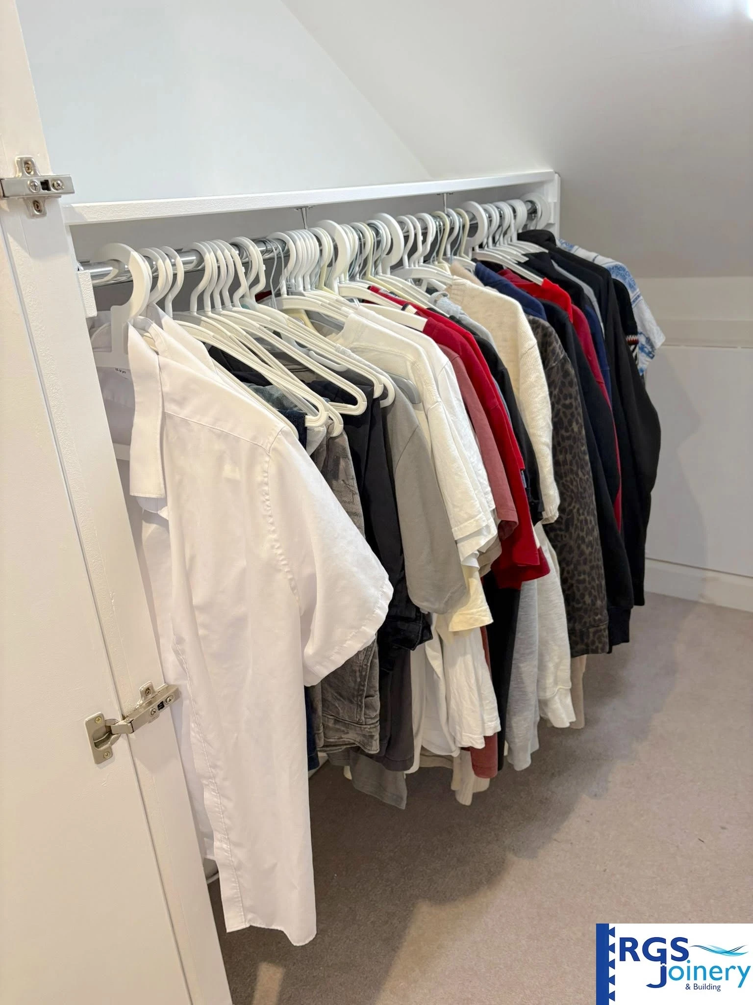 Loft walk-in wardrobe detail, built by RGS Joinery and Building