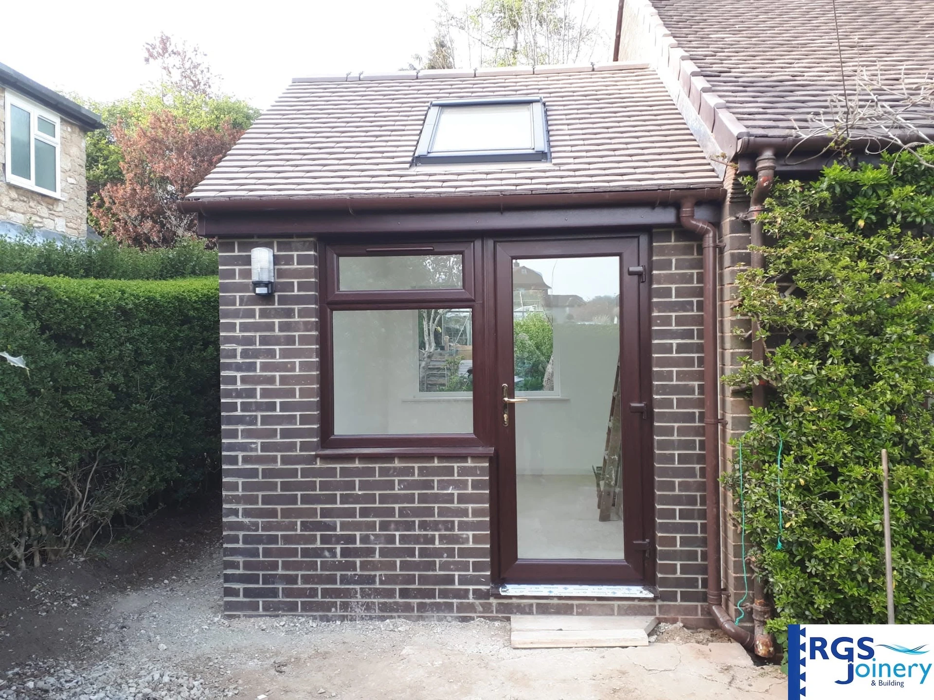 Sunroom Rebuild with Velux Windows — after