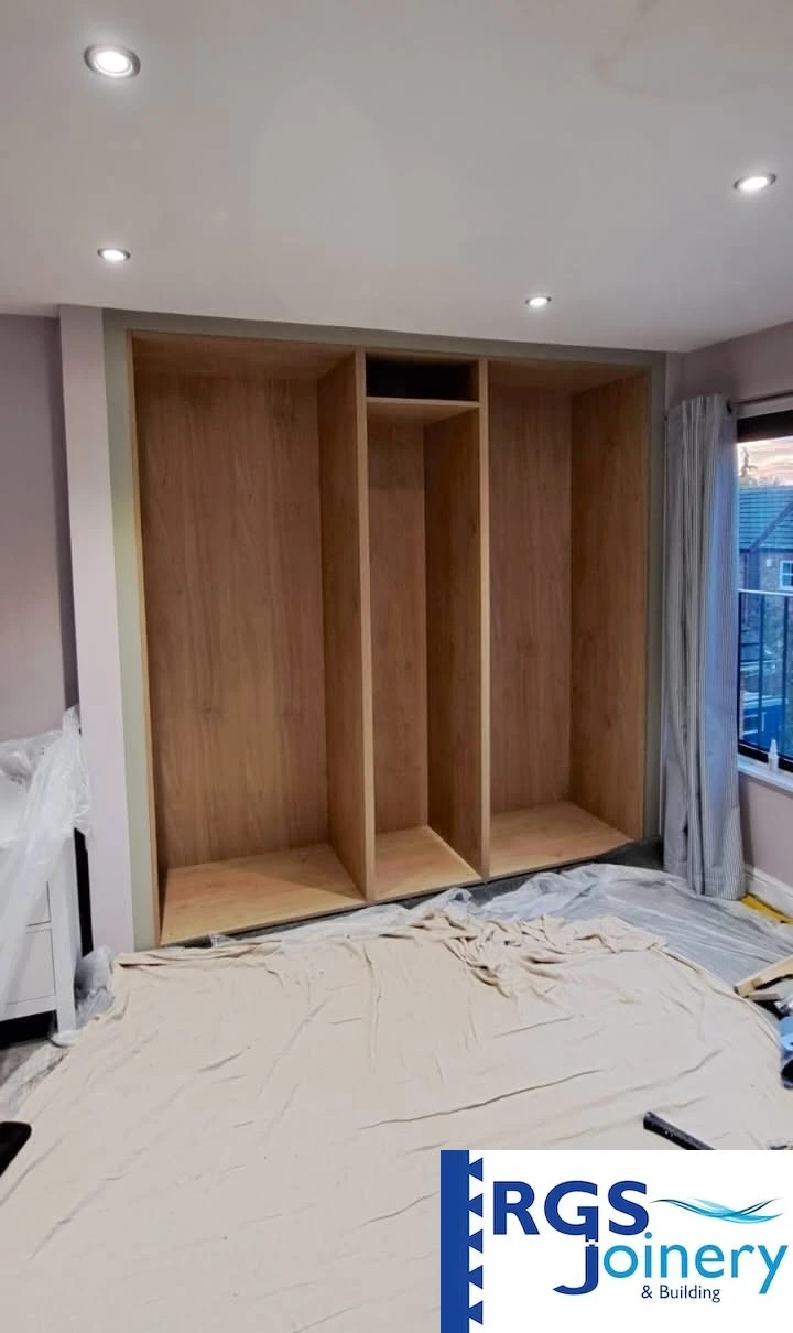 Sage Green Fitted Wardrobes before — Fitted Wardrobes in West Yorkshire by RGS Joinery and Building