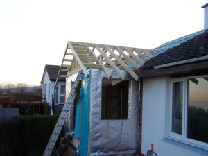 Timber Framed Extension With Two Decking Areas roof timber work