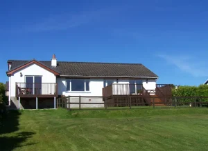 Timber Framed Extension With Two Decking Areas after