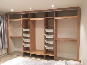 Built in Wardrobe with Sliding Mirrored Doors timber framework